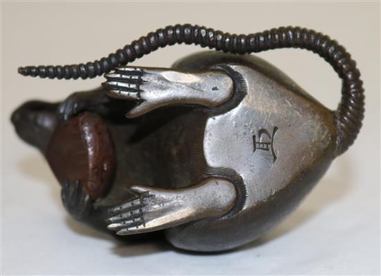 Two Japanese two-colour bronze models of a rat holding a nut, 19th century, length 9cm and 9.5cm